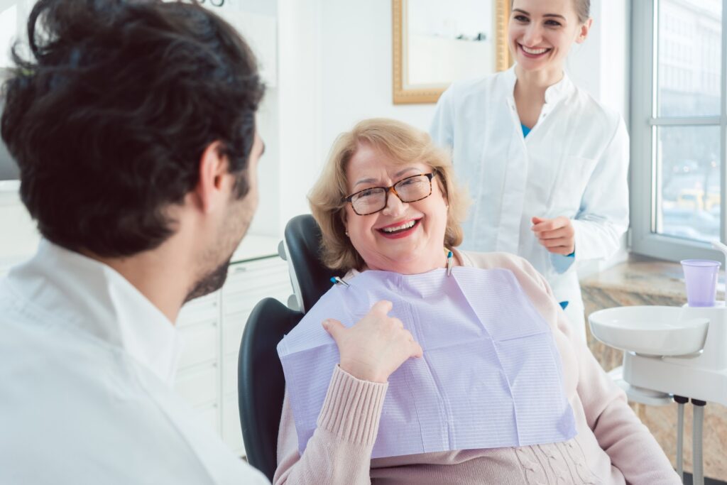 a happy patient after having dental treatment