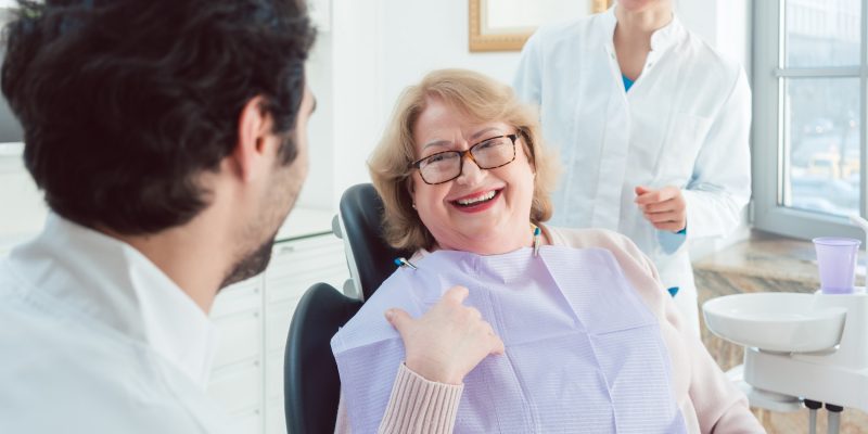 a happy patient after having dental treatment